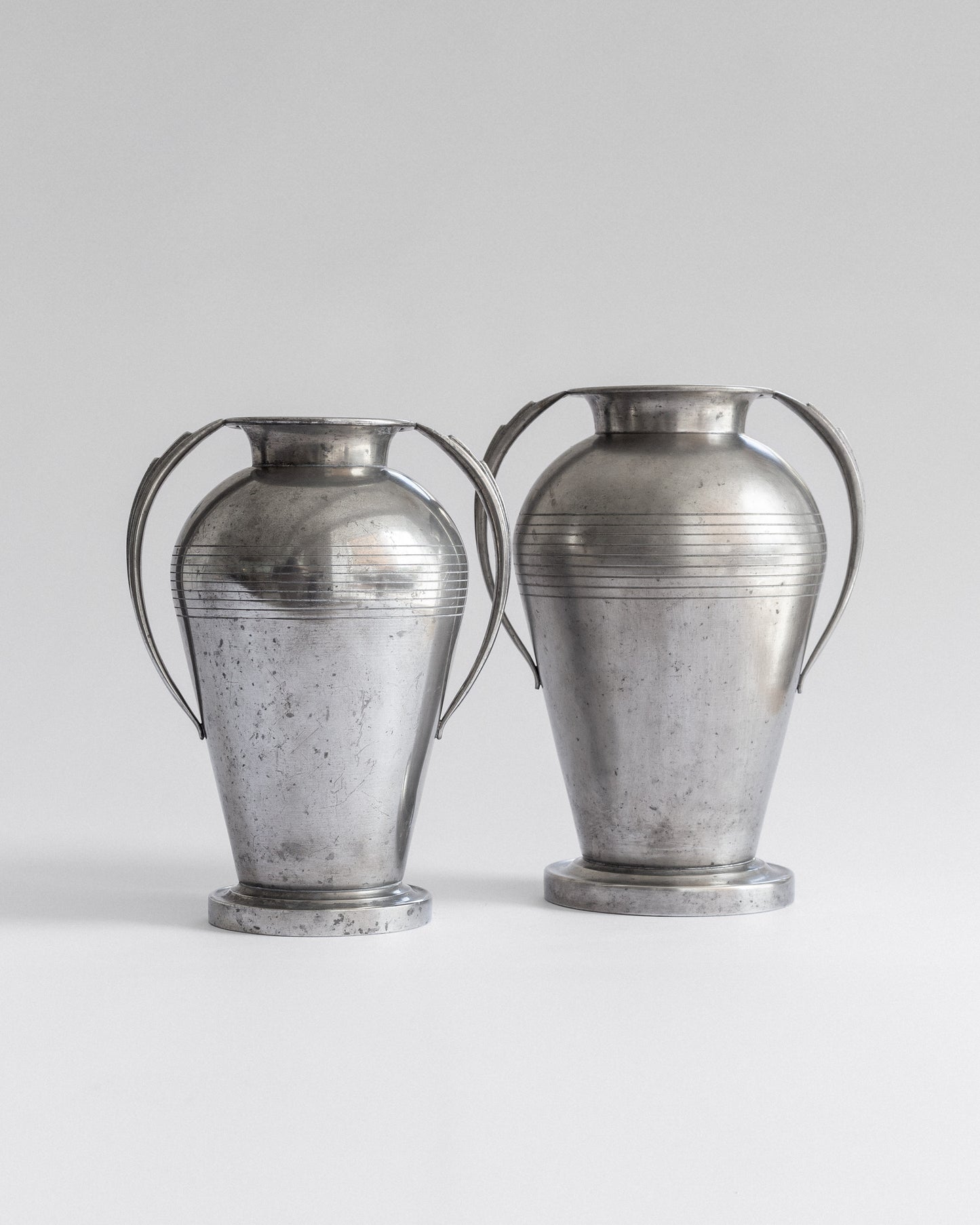Pair of Monumental Pewter Vases