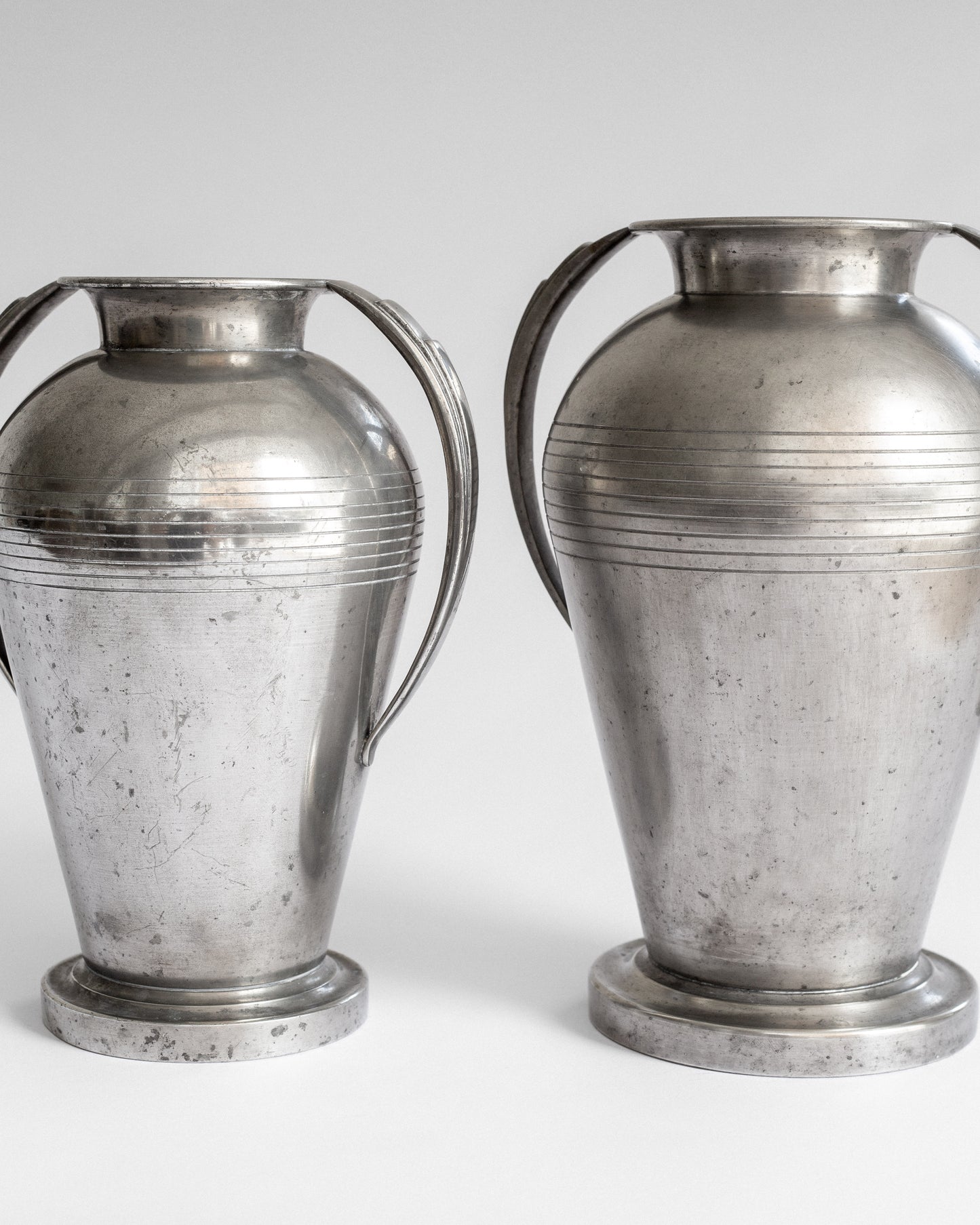 Pair of Monumental Pewter Vases