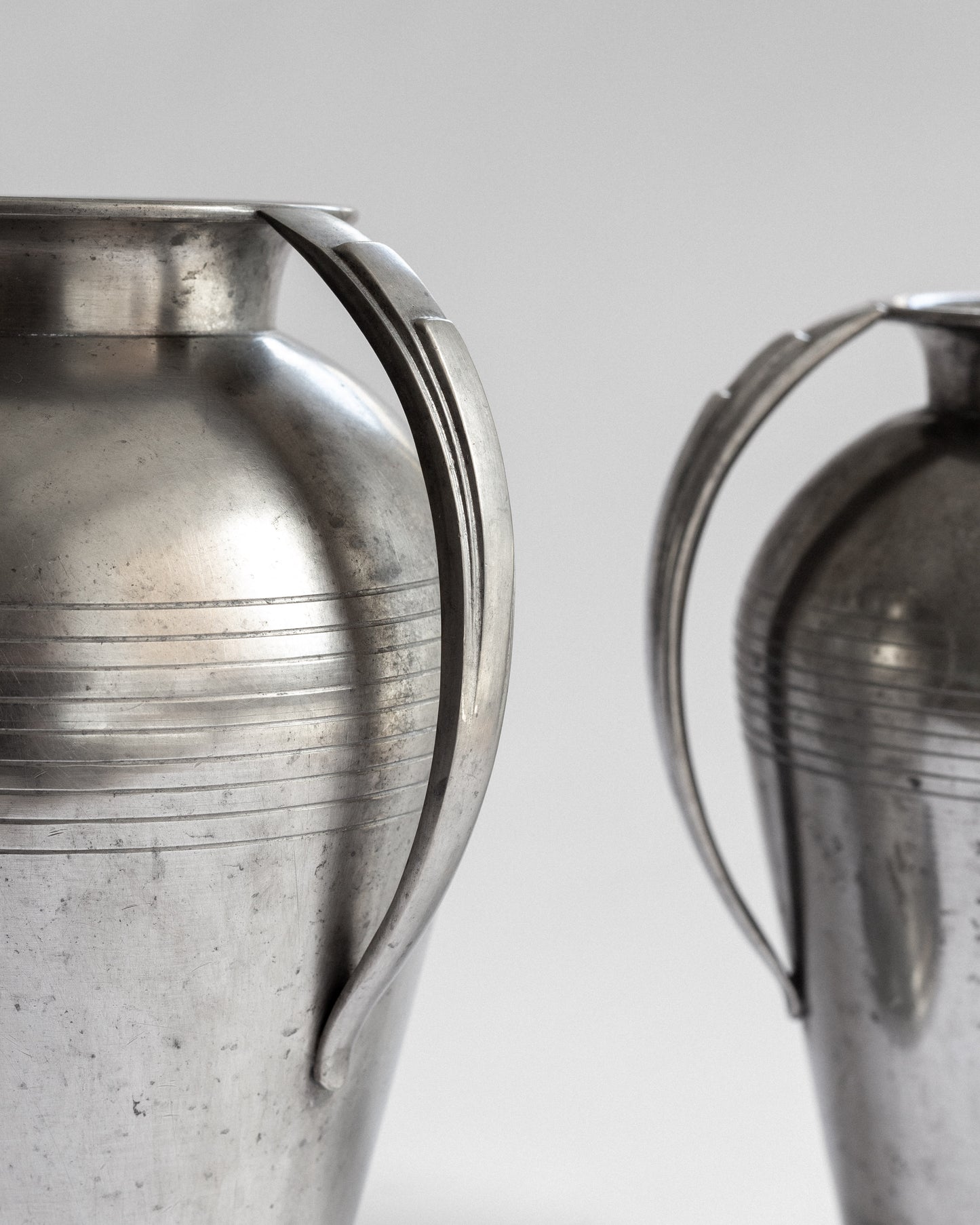 Pair of Monumental Pewter Vases