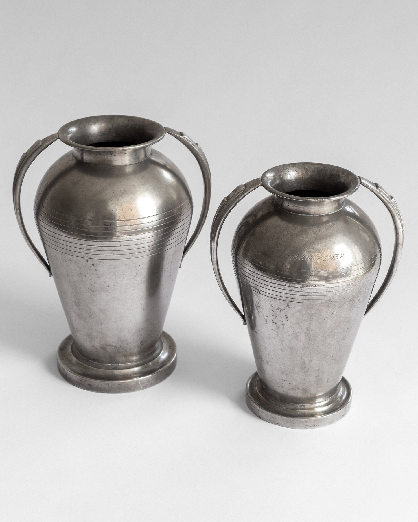 Pair of Monumental Pewter Vases