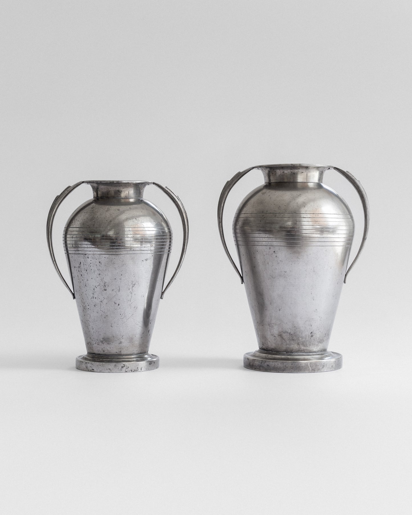 Pair of Monumental Pewter Vases